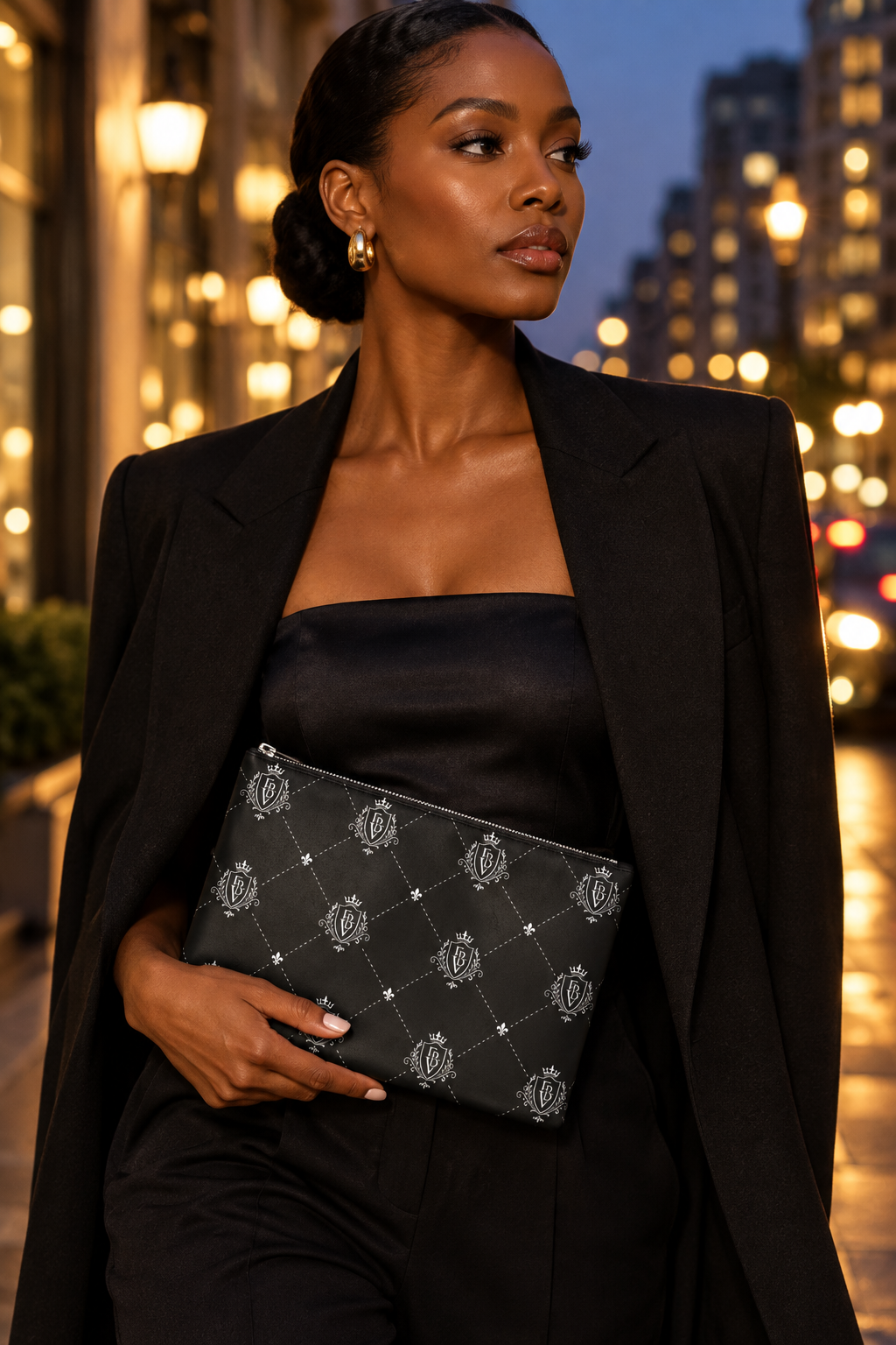 FETICHE ByVali Leather Clutch Bag in Noir, Evening Lights campaign scene with an African American model